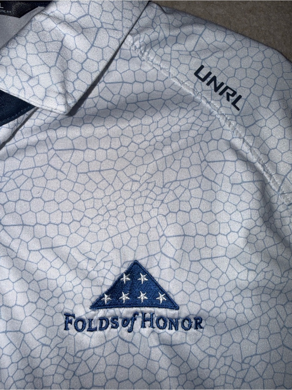 Unrl White Men's Folds of Honor Golf Polo with Subtle Pattern - Picture 2 of 3